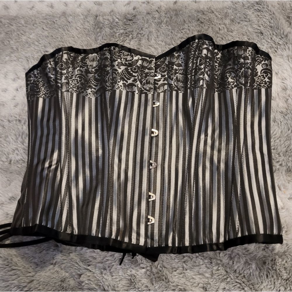 New True Steel boned striped Corset.